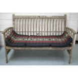 FIRMAN GARDEN BENCH, weathered teak with black and red squab cushion, 140cm W.