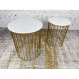 LAMP TABLES, a graduated pair, 1970's Italian design, circular marble tops on a gilt metal base,