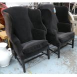 WINGBACK ARMCHAIRS, a pair, with a black velvet finish, 85cm W x 122cm H. (2) (some sun fading)