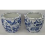 JARDINIERES, a pair, Chinese style blue and white. (2) (one with hair line crack)