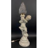 CHERUB TORCH TABLE LAMP, continental painted porcelain with frosted glass flame shade, 79cm H.
