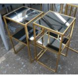 SIDE TABLES, a pair, 1960's French style, gilt metal with two mirrored tiers, 31cm x 31cm x 61cm. (