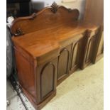 SIDEBOARD, Victorian mahogany, circa 1860, with three drawers above four doors enclosing sliding