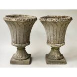 GARDEN URNS/PLANTERS, a pair, well weathered reconstituted stone circular with socle base, 63cm H