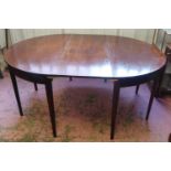 DINING TABLE, George III mahogany with an extra leaf on square tapered supports, (restorations).
