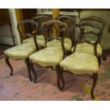 DINING CHAIRS, a set of six, mid Victorian rosewood, circa 1860, with yellow damask stuffover seats.