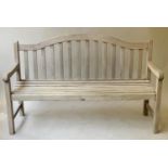 GARDEN BENCH, silvery weathered teak slatted with arched back, 152cm W.