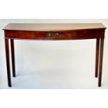 HALL/SERVING TABLE, George III flame mahogany of shallow bow form with frieze drawer and channeled