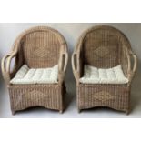 CONSERVATORY ARMCHAIRS, a pair, rattan framed and wicker woven with arched back and seat cushion,
