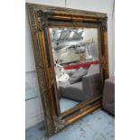 WALL MIRROR, gilt and silvered and faux tortoiseshell finish, bevelled glass, 142cm x 173cm.