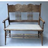 BENCH, early 20th century, possibly American, beech with curved spindle turned back, scroll arms and