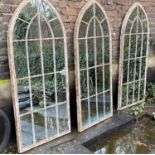 ARCHITECTURAL GARDEN MIRRORS, a set of three, arched tops, aged metal frames, 160cm x 67cm. (3)