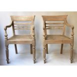 VERANDAH ARMCHAIRS, a pair, Anglo Indian Colonial style weathered teak, caned with reeded