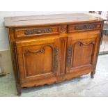 BUFFET, early 19th century French cherrywood with two drawers over a cupboard with carved decorative