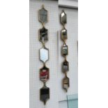 ARCHITECTURAL ACCENT WALL MIRRORS, a pair, gilt frames, 147cm x 14cm.