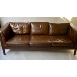 DANISH STOUBY SOFA, teak and mid brown grained leather three seater, 200cm W.