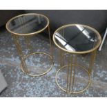 SIDE TABLES, a pair, 1960's French style, gilt metal and glass, 51cm H x 35.5cm Diam. (2)