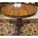 BREAKFAST TABLE, William IV, rosewood, with circular tilt top, on wood castors, 77cm H x 123cm D (