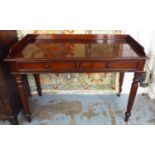WRITING TABLE, Victorian figured mahogany with a three quarter galleried top above two frieze