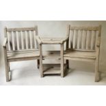 CONVERSATION BENCH BY ALEXANDER ROSE, weathered slatted teak with two armchairs and conjoined