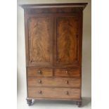 LINEN PRESS, William IV flame mahogany enclosing sliding trays with four drawers and turned
