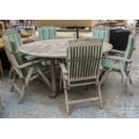 GARDEN TABLE, circular weathered teak 77cm H x 179cm and a set of six weathered teak adjustable