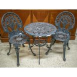 GARDEN SET, distressed painted metal table with circular top 63cm H x 61cm and a pair of chairs. (3)