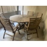 GARDEN SUITE, weathered teak octagonal radially segmented with six folding armchairs and sun