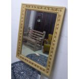 WALL MIRROR, rectangular bevelled with foliate decoration, 78cm W x 109cm H.