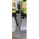 CONTEMPORARY SCHOOL SCULPTURAL STUDY, African lady, carved stone, 141cm H.