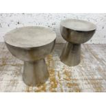 DRUM TABLES, a pair, polished hammered metal, 50cm H x 39cm x 39cm. (2)