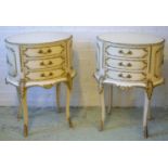 BEDSIDE CHESTS, a pair, Louis XV style, cream painted and gesso of oval form containing three