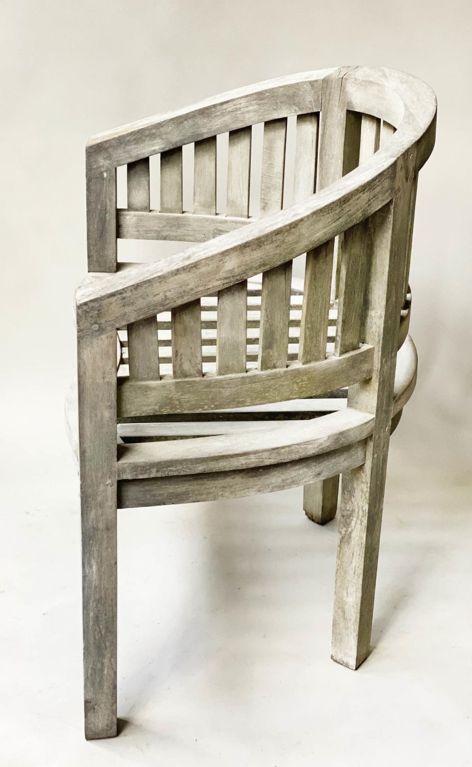 GARDEN TABLE, circular slatted weathered teak together with a Java teak garden armchair, 80cm diam x - Image 4 of 9