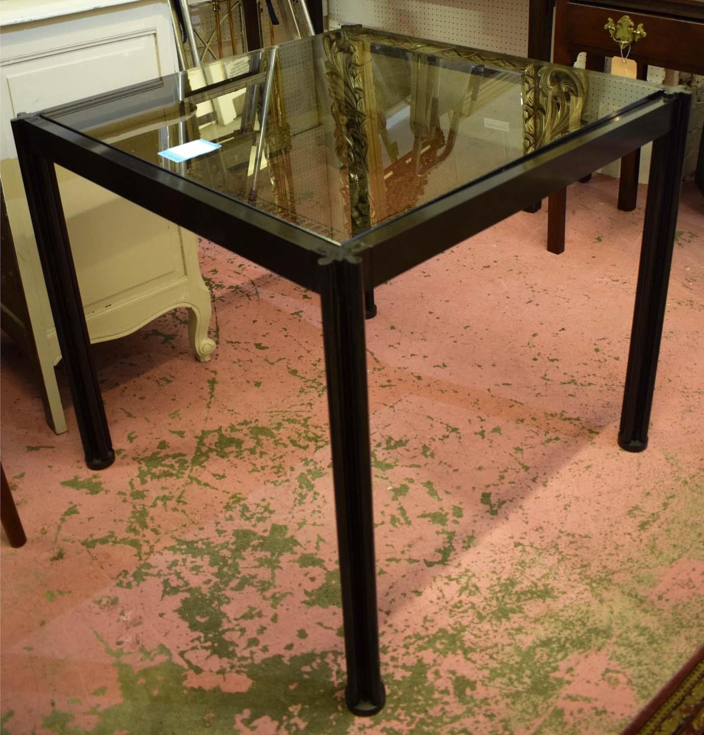 SIDE TABLE BY GEORGE CIANCHIMINO, circa 1970's, with a smoked glass top and metal frame, 79cm W x