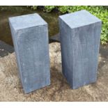 MARTINI GARDEN TABLES, a pair, faux stone, 71cm H x 27cm x 27cm. (2)
