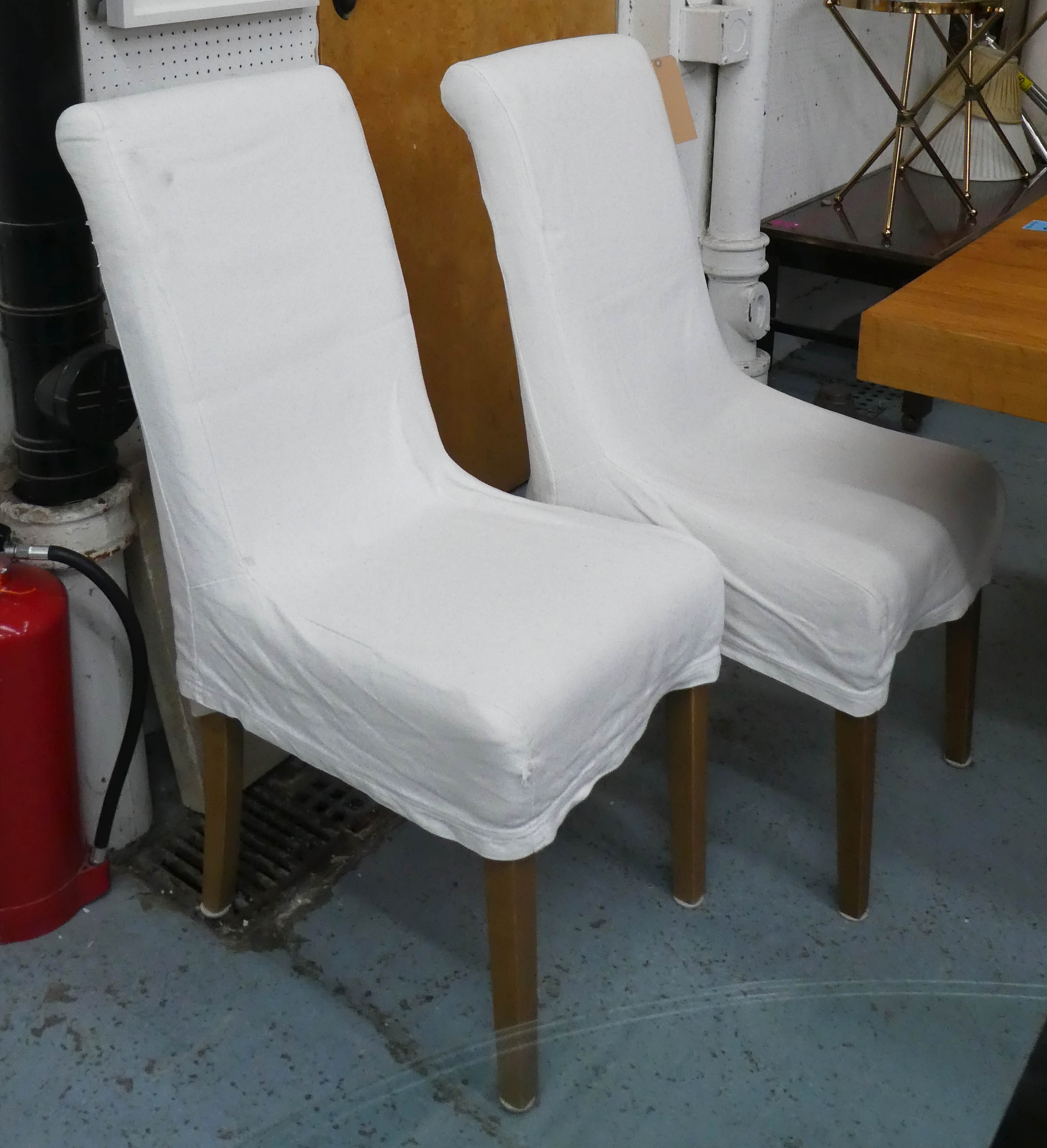 OKA DINING CHAIRS, six, 43cm W x 100cm H with removable cream covers. (6)