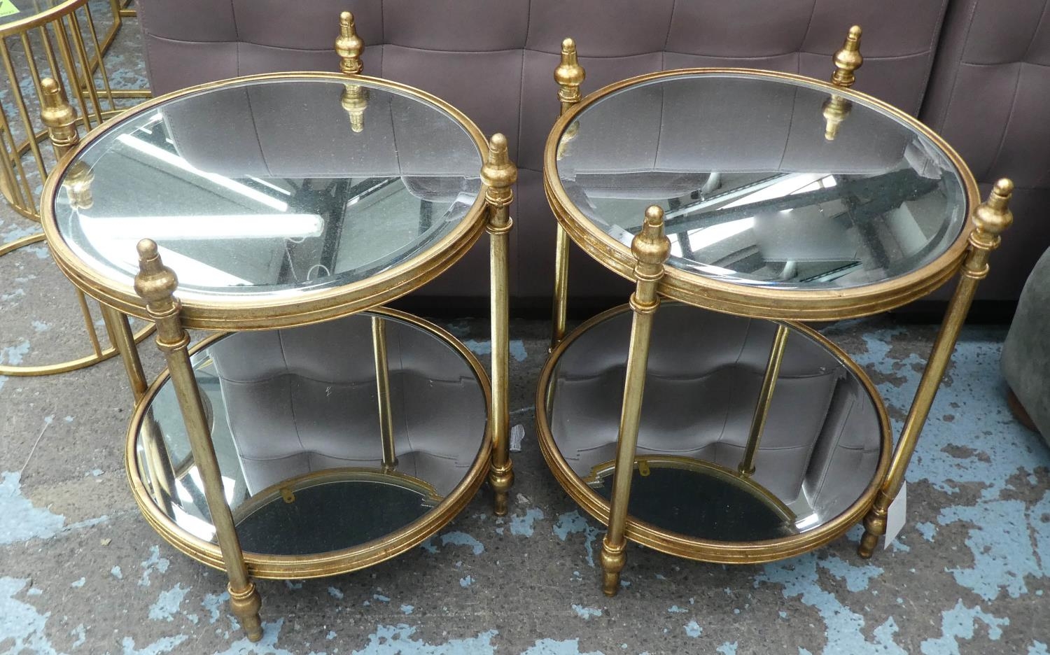 MAISON BAGUES STYLE SIDE TABLES, pair, 50cm diam x 54cm, gilt metal and mirror. (2)
