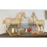 CHINESE POTTERY HORSES, a pair, Shang dynasty style, clear glaze, 40cm H x 40cm. (2)