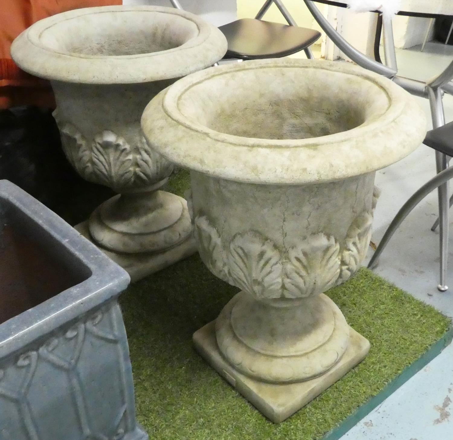 GARDEN URNS, two, with acanthus leaves, 63cm. (2)