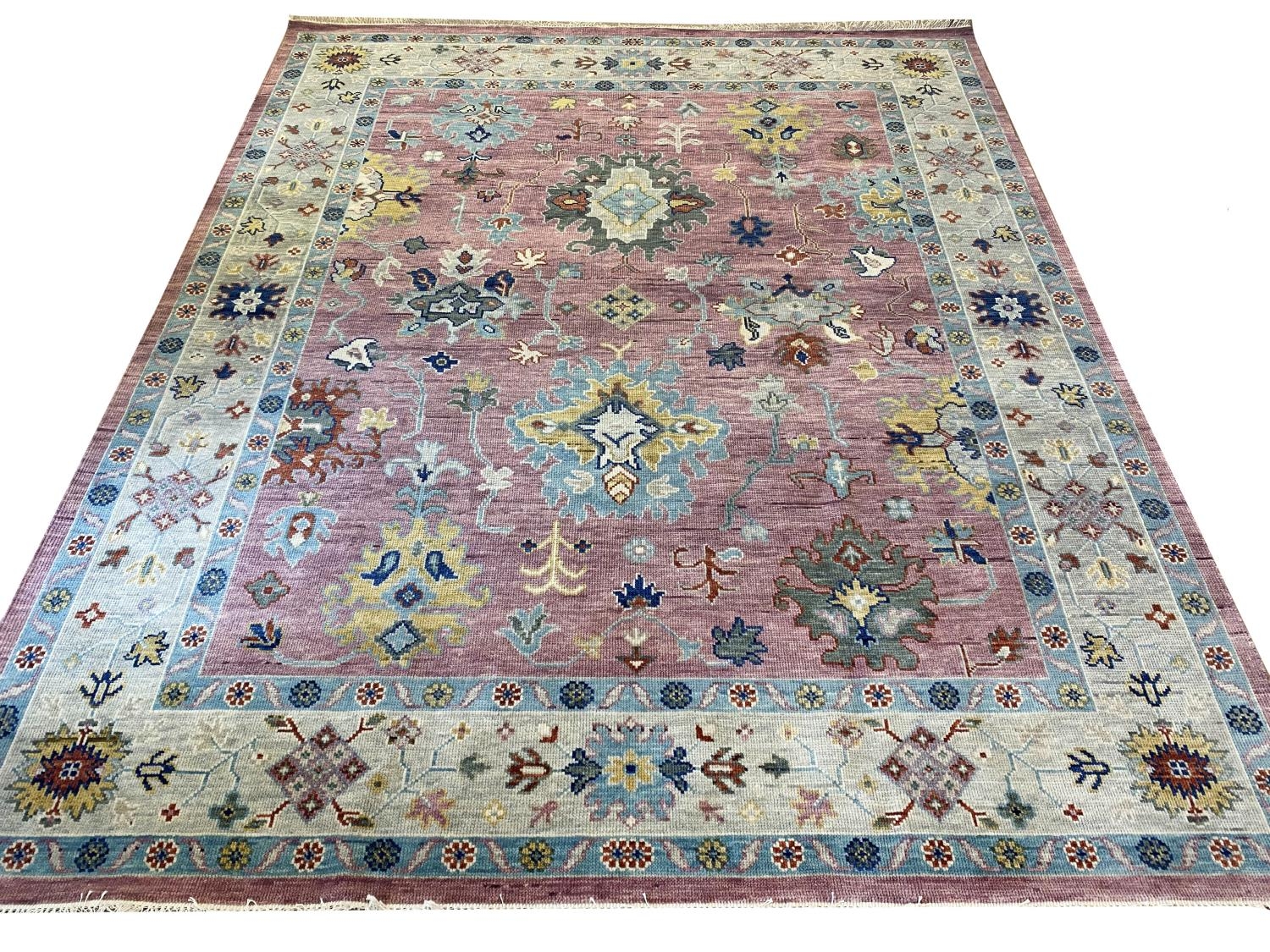 FINE CONTEMPORARY OUSHAK CARPET, 305cm x 250cm.