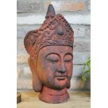 TERRACOTTA BUDDHA HEADS, three, 46cm x 26cm. (3)