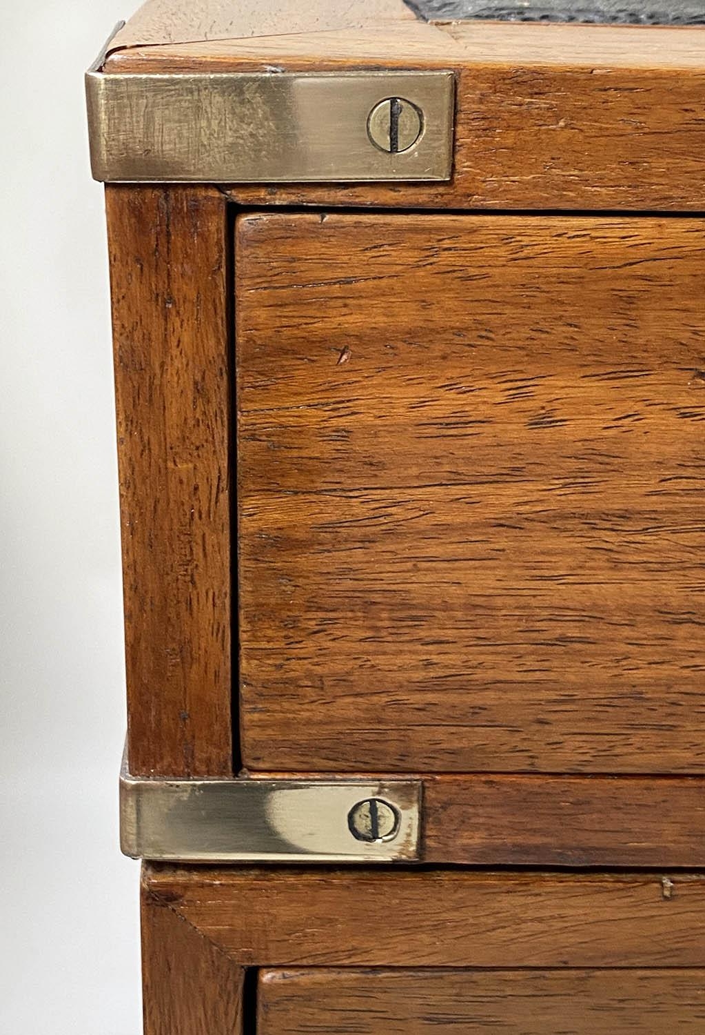 PEDESTAL DESK, campaign style faded teak and brass bound with nine drawers and tooled black - Image 5 of 6