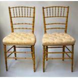 SALON CHAIRS, a pair, 19th century faux bamboo framed with button yellow satin seats. (2)