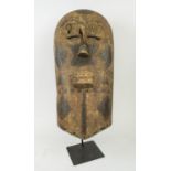 LEGA MASK, from the Congo used as a symbol of continuity passed down the generations, 66cm H.