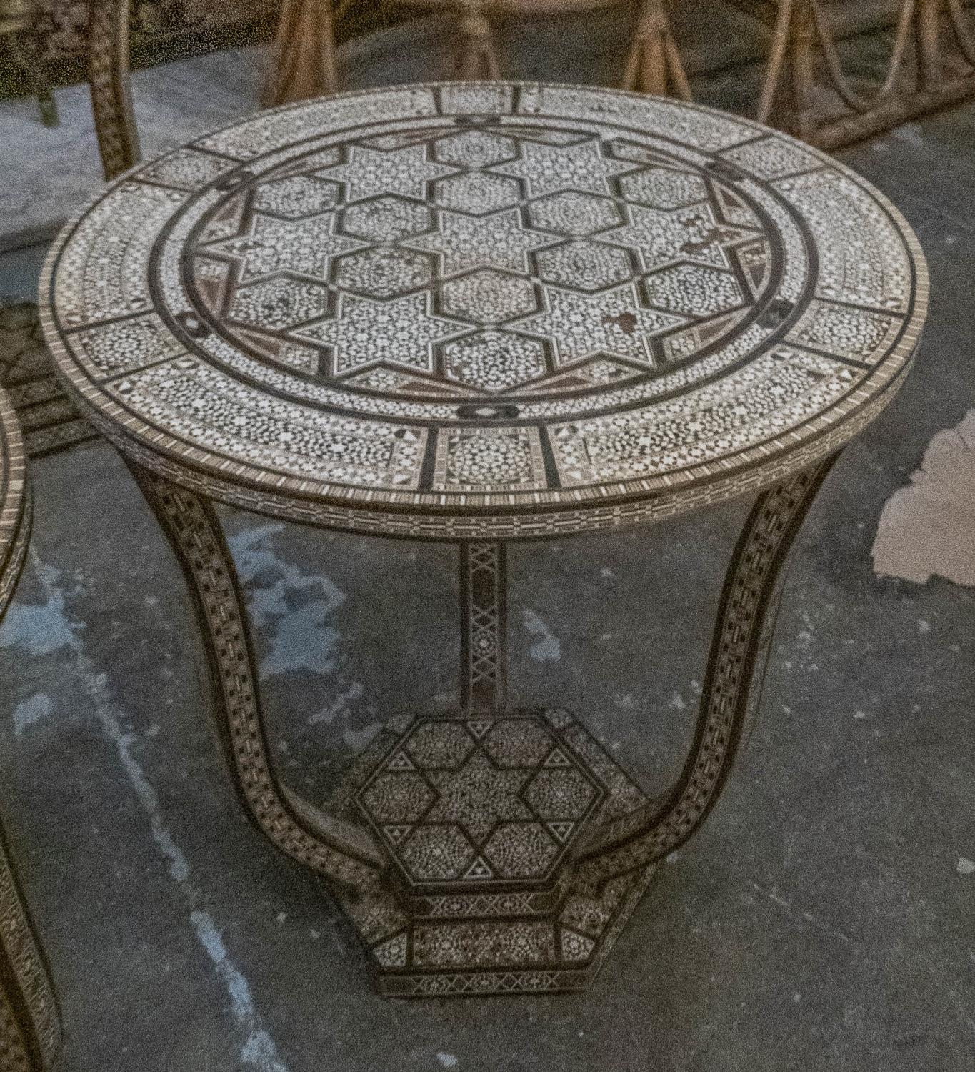 DAMASCUS TABLES, each 42cm W x 52cm H, two inlaid, circular. (2)