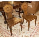 HALL CHAIRS, a pair, each 45cm W x 89cm H, Regency oak. (2)