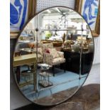 CIRCULAR WALL MIRROR, with a sectional plate, 90cm diam.