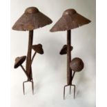 GARDEN MUSHROOMS, 88cm H approx, two rusty with spring mounted leaves. (2)