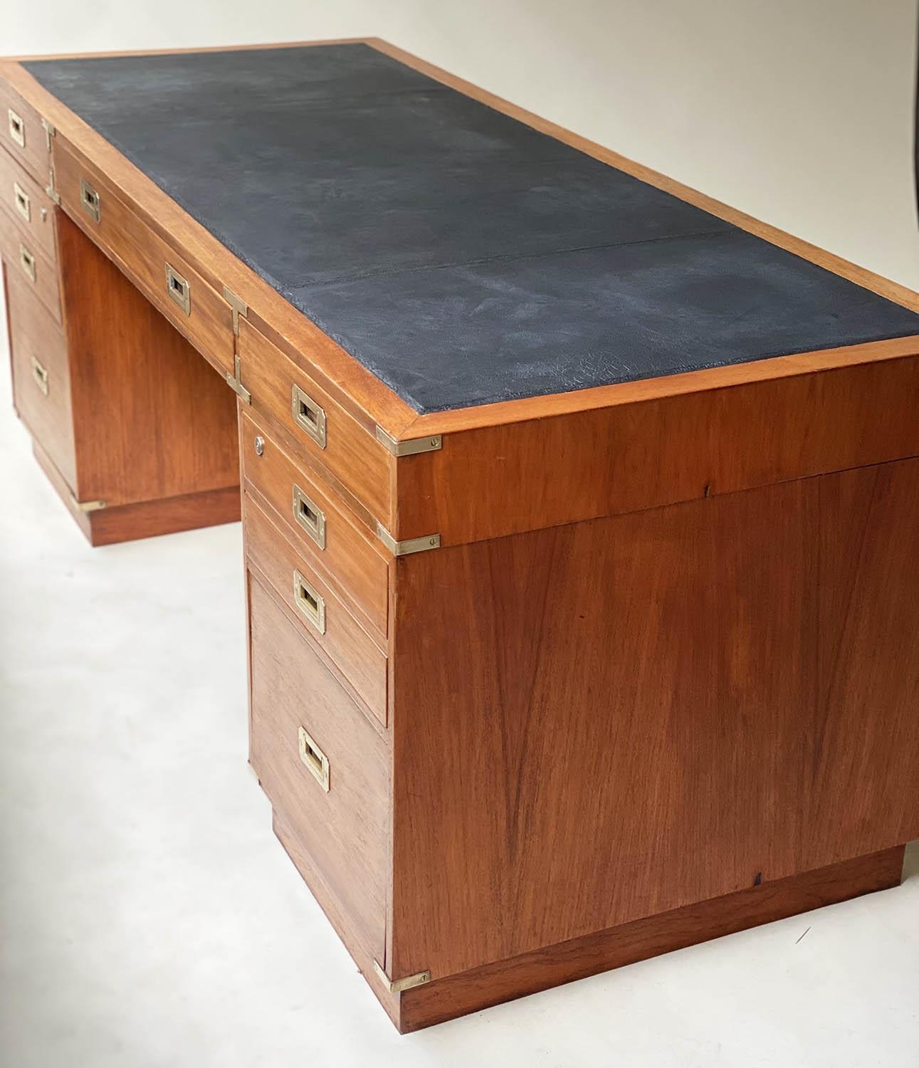 PEDESTAL DESK, campaign style faded teak and brass bound with nine drawers and tooled black - Image 2 of 6