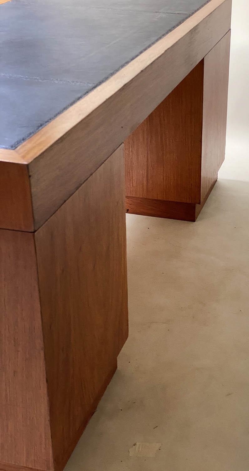 PEDESTAL DESK, campaign style faded teak and brass bound with nine drawers and tooled black - Image 4 of 6